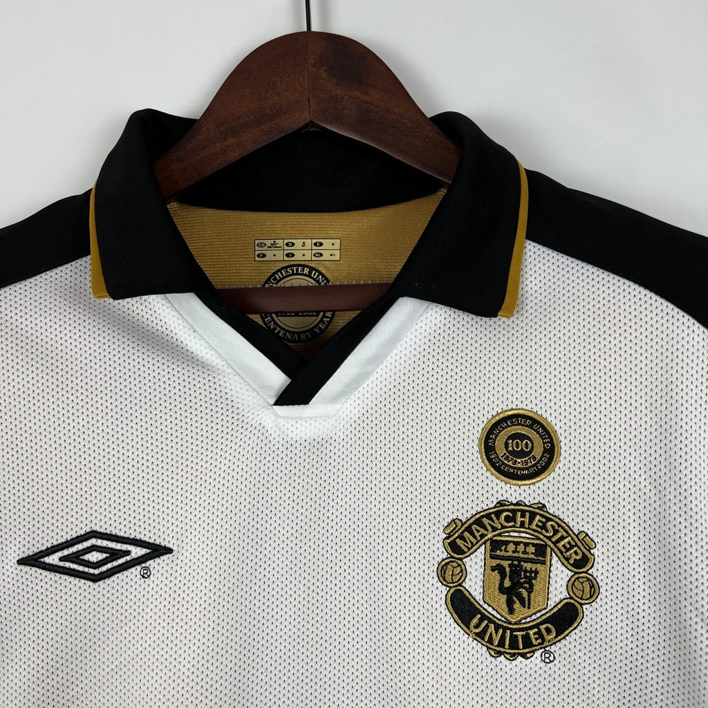 Camisa Dupla Face Retrô Manchester United 2001/02 100 Anos Masculina Branca e Preta ou Dourada