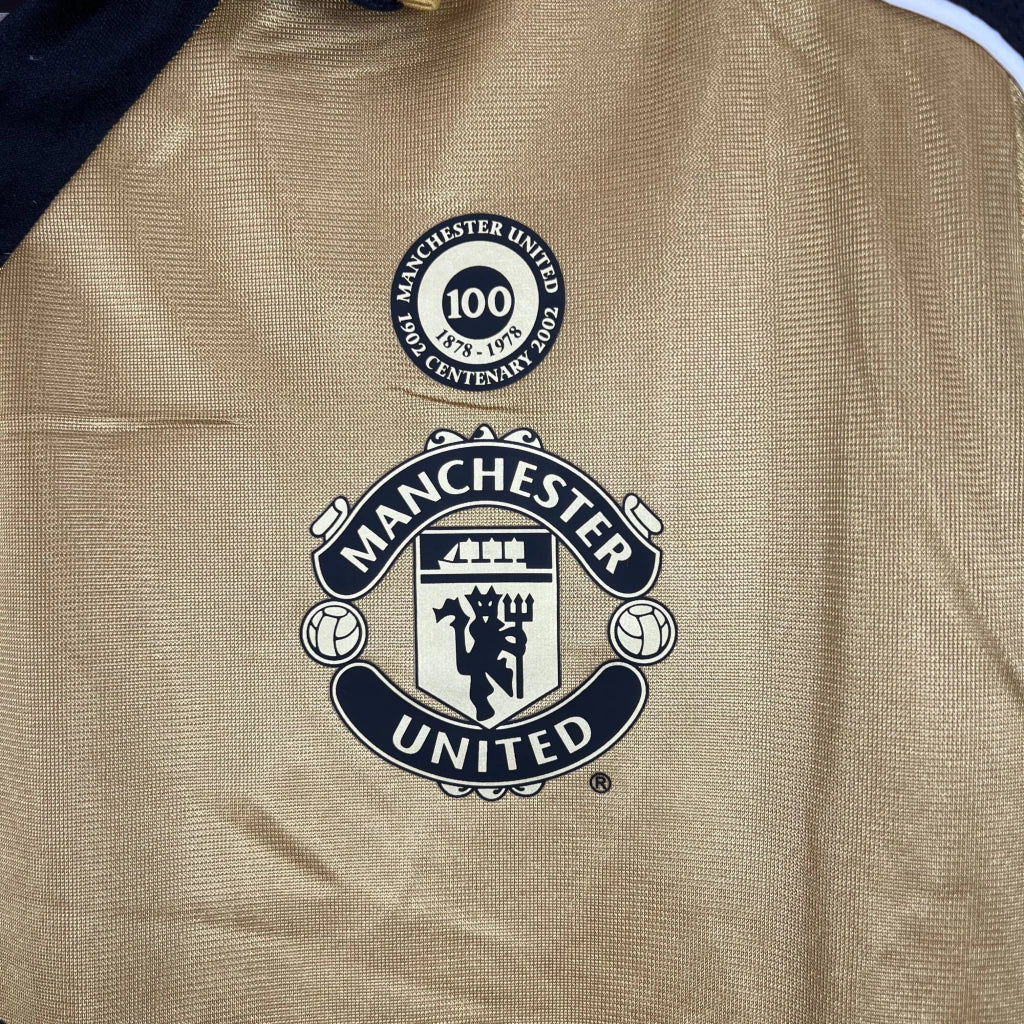 Camisa Dupla Face Retrô Manchester United 2001/02 100 Anos Masculina Branca e Preta ou Dourada